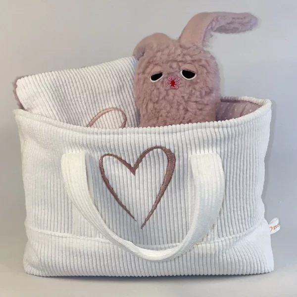 Geschenkset zur Taufe Mädchen mit Kuscheltier, Kirschkernkissen und praktischer Stofftasche.